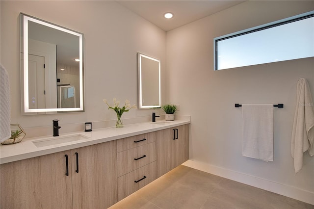 366 Fordham Rd, Venice, FL 34293 - bathroom with double vanity, a shower, and recessed lighting