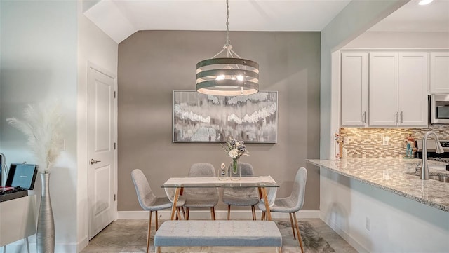 15160 Lyla Ter, Bradenton, FL 34211 - dining space featuring baseboards and a chandelier