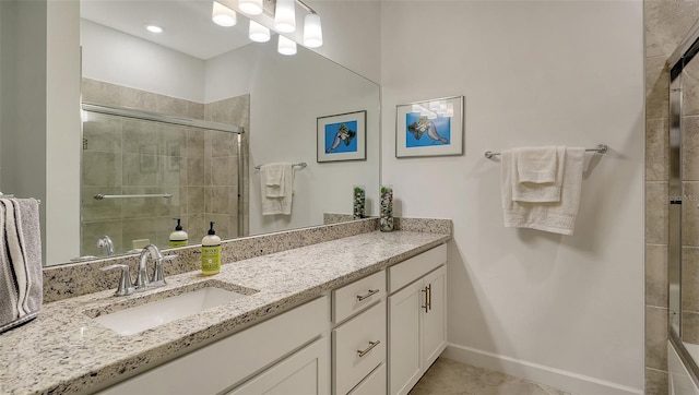 15160 Lyla Ter, Bradenton, FL 34211 - bathroom with vanity, tiled shower, and tile patterned floors