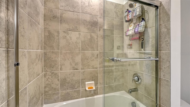 15160 Lyla Ter, Bradenton, FL 34211 - bathroom featuring combined bath / shower with glass door