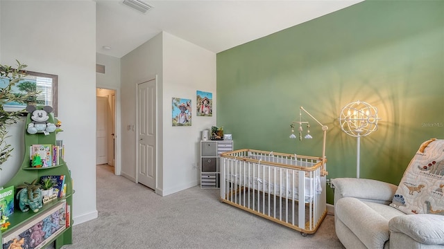 15160 Lyla Ter, Bradenton, FL 34211 - bedroom with carpet floors, a chandelier, a closet, and a crib