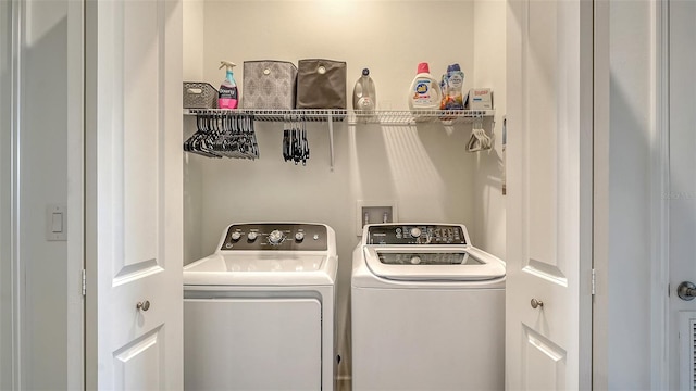 15160 Lyla Ter, Bradenton, FL 34211 - laundry area featuring separate washer and dryer