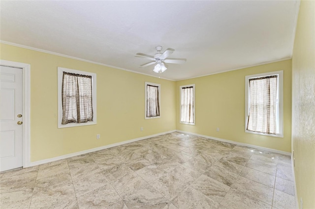 557 Reading St NW, Port Charlotte, FL 33952 - unfurnished room with healthy amount of natural light, ornamental molding, and a ceiling fan