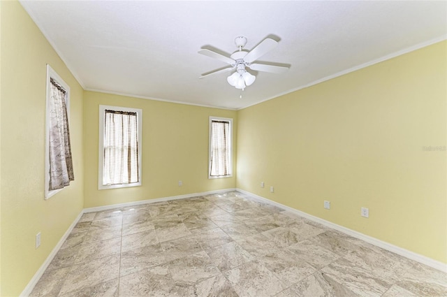 557 Reading St NW, Port Charlotte, FL 33952 - spare room featuring ornamental molding, plenty of natural light, a ceiling fan, and stone finish flooring