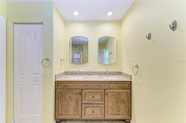 557 Reading St NW, Port Charlotte, FL 33952 - full bath featuring double vanity and a closet