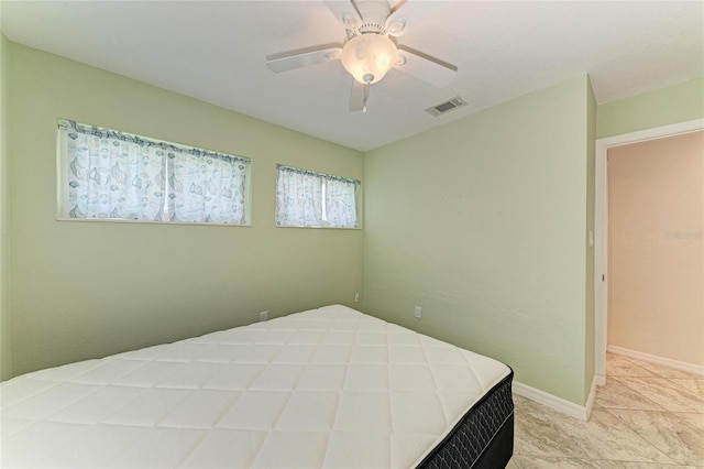 557 Reading St NW, Port Charlotte, FL 33952 - bedroom with ceiling fan