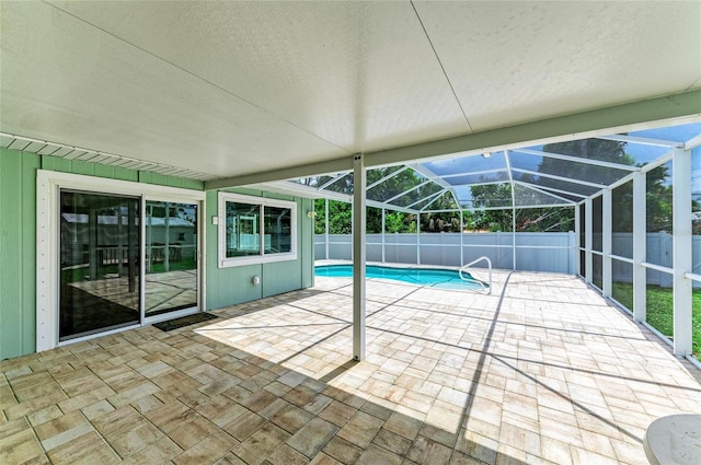 557 Reading St NW, Port Charlotte, FL 33952 - view of pool featuring a patio area, a fenced backyard, and glass enclosure