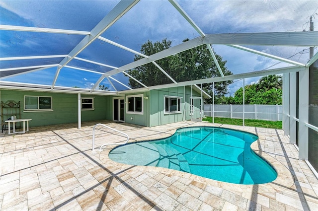 557 Reading St NW, Port Charlotte, FL 33952 - view of pool with a patio area and glass enclosure