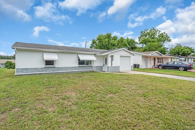 5401 Mac Arthur Ave, New Port Richey, FL 34652 - ranch-style house featuring concrete driveway, a garage, a front lawn, and stucco siding