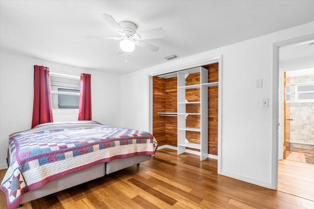 5401 Mac Arthur Ave, New Port Richey, FL 34652 - bedroom with wood finished floors and a ceiling fan