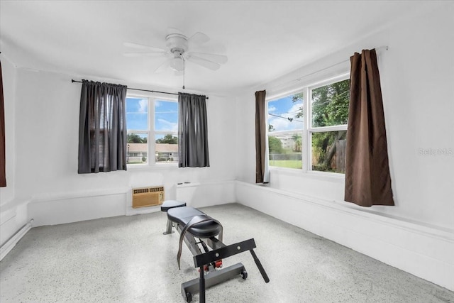 5401 Mac Arthur Ave, New Port Richey, FL 34652 - exercise room with a ceiling fan and a wall mounted air conditioner