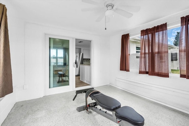 5401 Mac Arthur Ave, New Port Richey, FL 34652 - exercise area with plenty of natural light and a ceiling fan