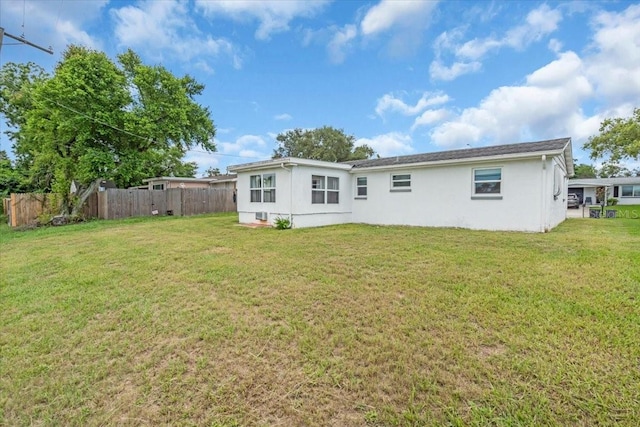 5401 Mac Arthur Ave, New Port Richey, FL 34652 - back of property featuring stucco siding