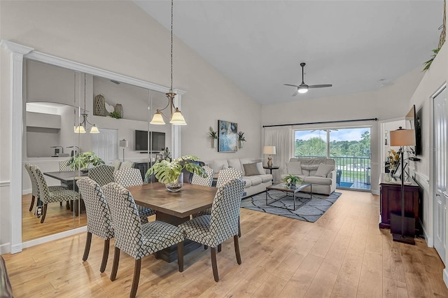 5240 Hyland Hills Ave Unit 1425, Sarasota, FL 34241 - dining space featuring high vaulted ceiling, a ceiling fan, and light wood-style floors