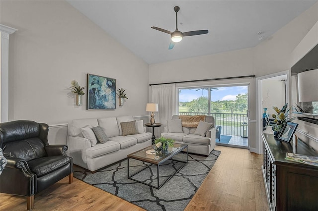 5240 Hyland Hills Ave Unit 1425, Sarasota, FL 34241 - living room featuring high vaulted ceiling, a ceiling fan, and light wood-style flooring
