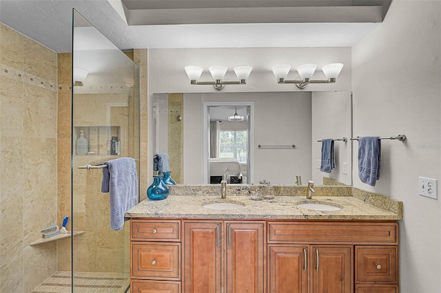 5240 Hyland Hills Ave Unit 1425, Sarasota, FL 34241 - bathroom featuring a shower stall, double vanity, and ensuite bath