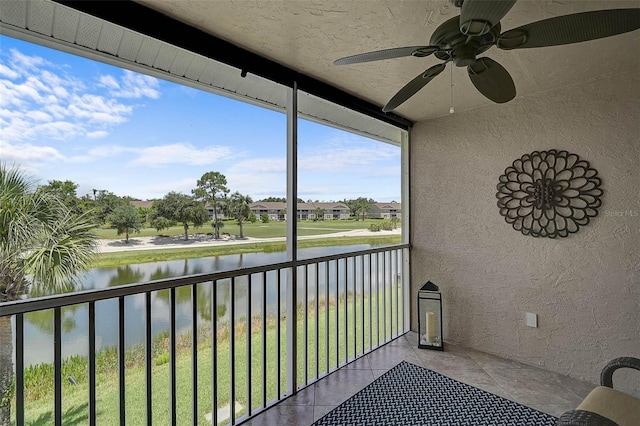 5240 Hyland Hills Ave Unit 1425, Sarasota, FL 34241 - unfurnished sunroom featuring a water view and ceiling fan