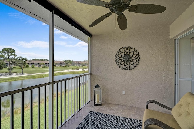 5240 Hyland Hills Ave Unit 1425, Sarasota, FL 34241 - balcony with a water view, ceiling fan, and a residential view