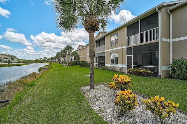 5240 Hyland Hills Ave Unit 1425, Sarasota, FL 34241 - view of community featuring a lawn and a water view