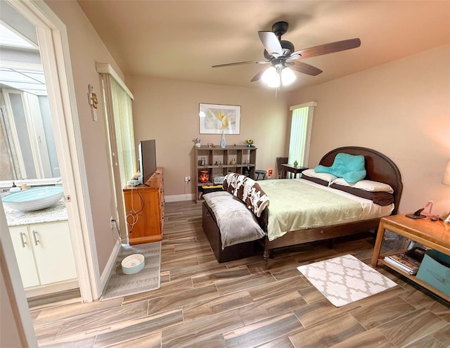 1502 Georgetowne Ln, Sarasota, FL 34232 - bedroom featuring light wood-style flooring and ceiling fan