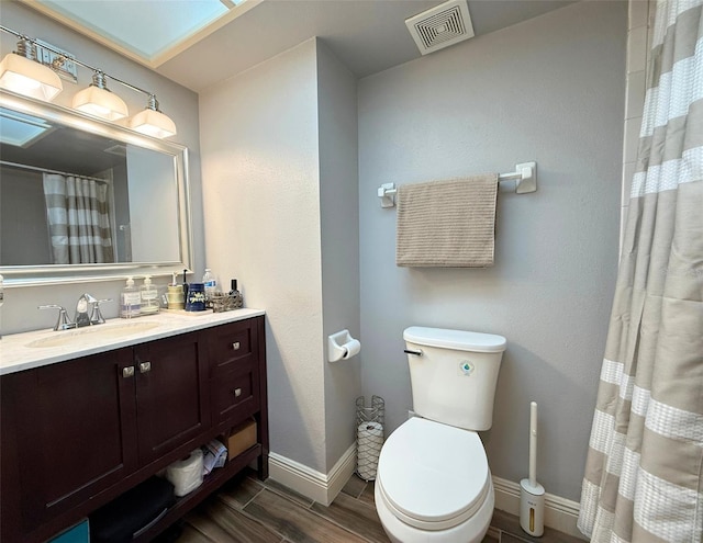 1502 Georgetowne Ln, Sarasota, FL 34232 - full bathroom with vanity, wood finished floors, and a shower with curtain