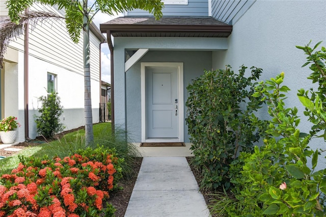 9144 Royal River Cir, Parrish, FL 34219 - entrance to property featuring stucco siding