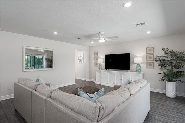 9144 Royal River Cir, Parrish, FL 34219 - living room with a ceiling fan, dark wood-type flooring, a textured ceiling, and recessed lighting