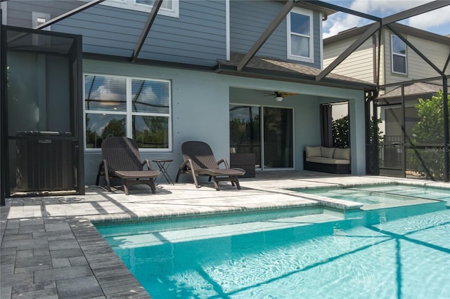9144 Royal River Cir, Parrish, FL 34219 - view of swimming pool featuring a lanai, a patio, ceiling fan, and a pool with connected hot tub