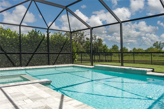 9144 Royal River Cir, Parrish, FL 34219 - view of swimming pool with a pool with connected hot tub and glass enclosure