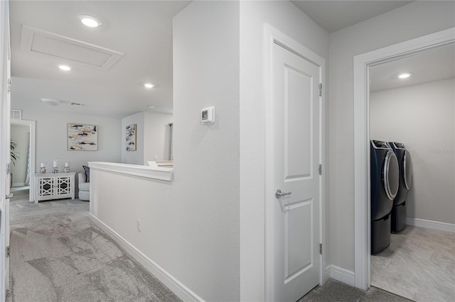 9144 Royal River Cir, Parrish, FL 34219 - hall with independent washer and dryer, attic access, recessed lighting, carpet flooring, and an upstairs landing