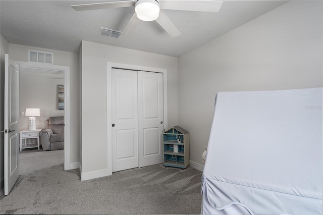 9144 Royal River Cir, Parrish, FL 34219 - bedroom with carpet floors, a closet, and ceiling fan