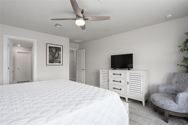 9144 Royal River Cir, Parrish, FL 34219 - bedroom featuring light carpet and a ceiling fan