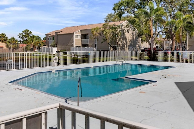 7298 Ulmerton Rd Unit 202, Largo, FL 33771 - community pool with a residential view and a patio area