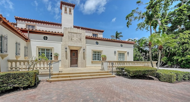 4423 Bay Shore Rd, Sarasota, FL 34234 - view of front of property featuring stucco siding and a tile roof