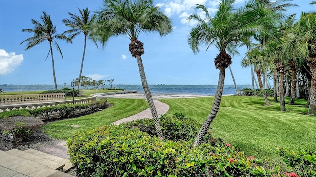 4423 Bay Shore Rd, Sarasota, FL 34234 - view of home's community with a water view and a lawn