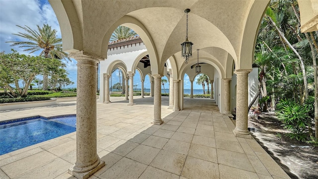 4423 Bay Shore Rd, Sarasota, FL 34234 - view of patio / terrace featuring an outdoor pool