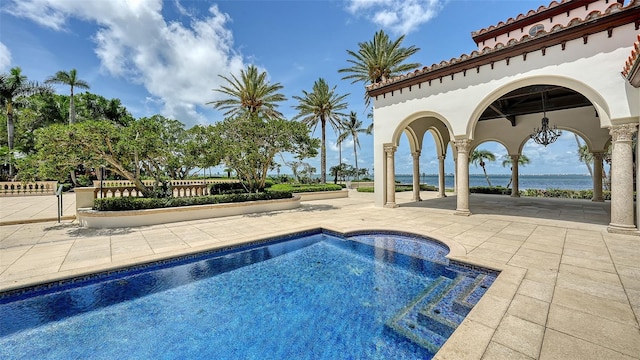 4423 Bay Shore Rd, Sarasota, FL 34234 - swimming pool with a patio area and a water view