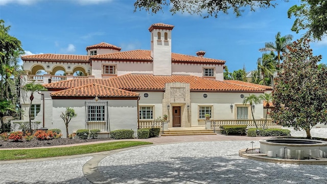 4423 Bay Shore Rd, Sarasota, FL 34234 - view of front of property featuring a tile roof and stucco siding