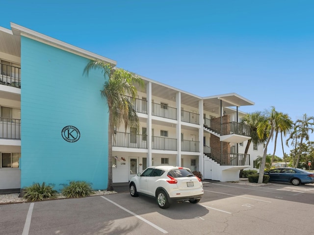 2423 Flamingo Blvd Unit K29, Bradenton, FL 34207 - view of apartment building / complex featuring uncovered parking and stairs
