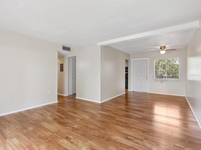 2423 Flamingo Blvd Unit K29, Bradenton, FL 34207 - unfurnished room featuring ceiling fan, light wood-style floors, and a textured ceiling