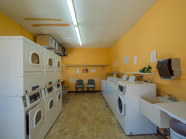 2423 Flamingo Blvd Unit K29, Bradenton, FL 34207 - community laundry room featuring stacked washer and clothes dryer and washer and dryer
