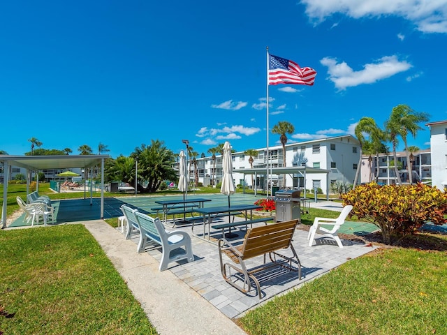 2423 Flamingo Blvd Unit K29, Bradenton, FL 34207 - view of property's community with a yard, a residential view, and shuffleboard