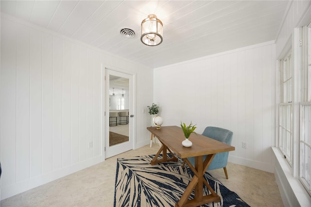 311 Island Cir, Sarasota, FL 34242 - dining space featuring light colored carpet and crown molding