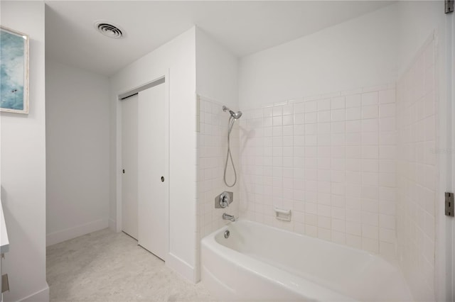 311 Island Cir, Sarasota, FL 34242 - bathroom featuring bathtub / shower combination and baseboards
