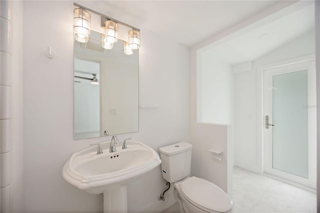 311 Island Cir, Sarasota, FL 34242 - half bath featuring toilet and a sink