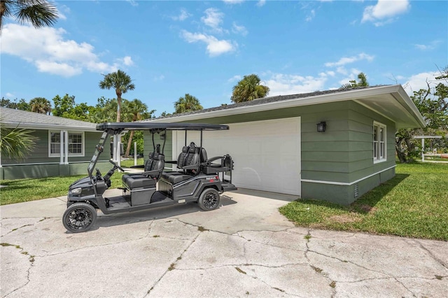 311 Island Cir, Sarasota, FL 34242 - exterior space featuring crawl space, a front lawn, concrete driveway, and a garage