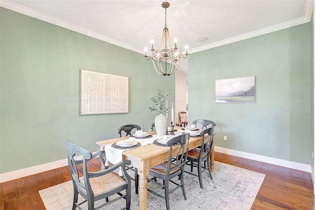 1906 143rd Ct E, Bradenton, FL 34212 - dining area featuring a chandelier, ornamental molding, and wood finished floors