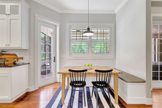 1906 143rd Ct E, Bradenton, FL 34212 - dining space with breakfast area, ornamental molding, and light wood-style floors