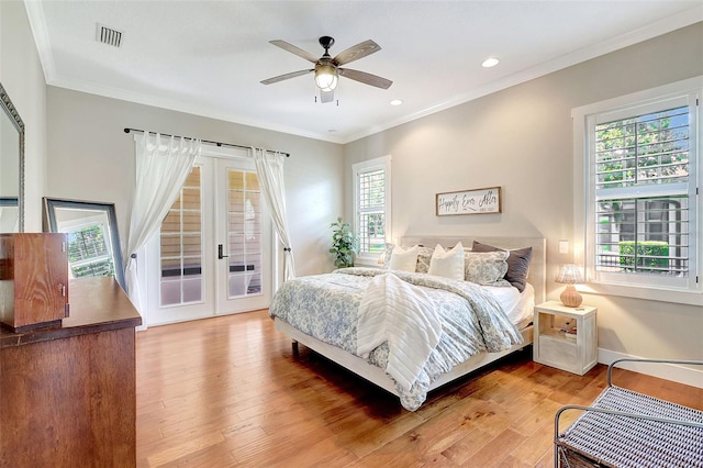 1906 143rd Ct E, Bradenton, FL 34212 - bedroom featuring access to exterior, ornamental molding, wood finished floors, french doors, and recessed lighting