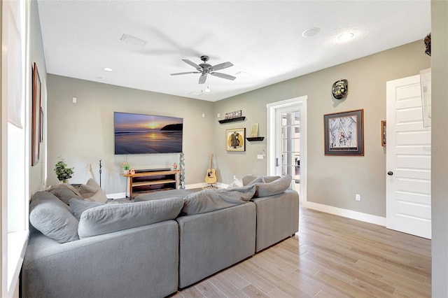 1906 143rd Ct E, Bradenton, FL 34212 - living room featuring a ceiling fan, light wood finished floors, and recessed lighting